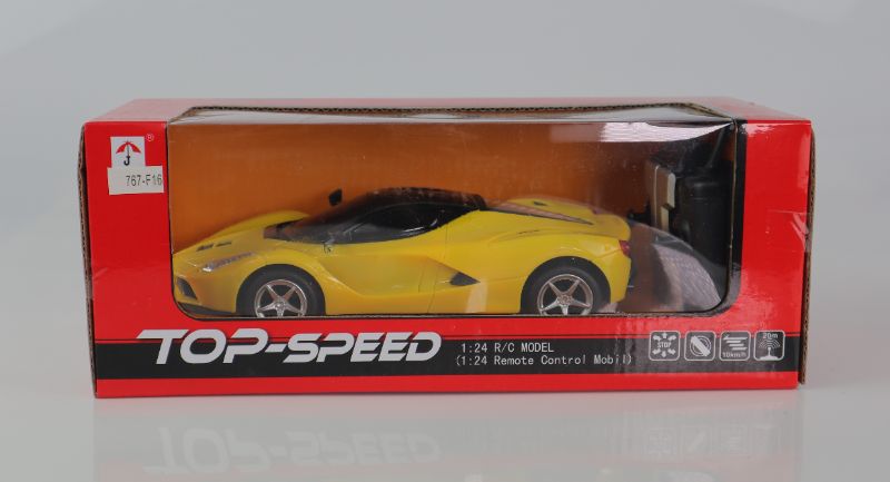 Photo 1 of TOP SPEED RC TOY CAR FAUX FERRARI VEHICLE BUTTERFLY DOORS OPEN REMOTE OPERATED SPEED 10KM//H COLOR YELLOW 5 AA BATTERIES NOT INCLUDED NEW $45