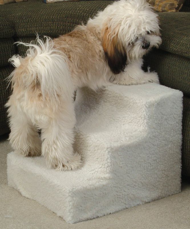 Photo 2 of ETNA COLLAPSIBLE PET STEPS WITH FLEECE COVER NO TOOLS NEEDED FOR DOGS UP TO 70 POUNDS COVER WASHABLE BOX HAS DAMAGE DUE TO SHIPMENT NEW PRODUCT $39.95