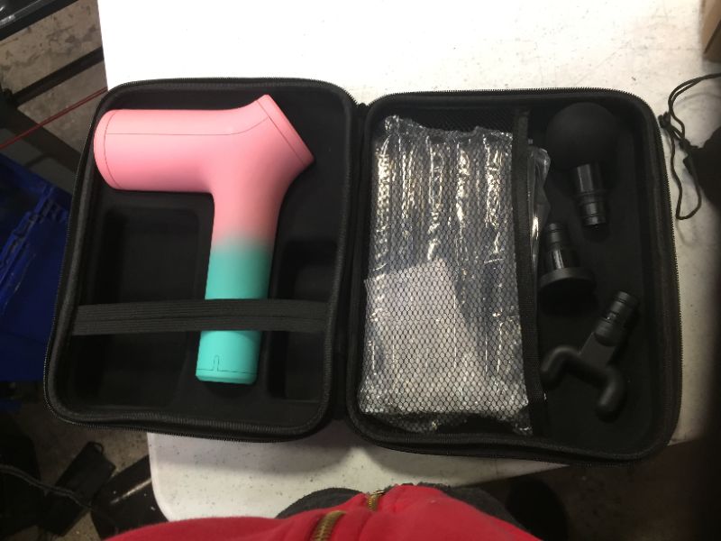 Photo 2 of MINT AND PINK MASSAGE GUN CHARGES 6 HOURS FOR FULL POWER 10 SPEED LEVELS 6 ADJUSTABLE HEADS FOR UPPER BODY OR LOWER BODY NEW $125.99