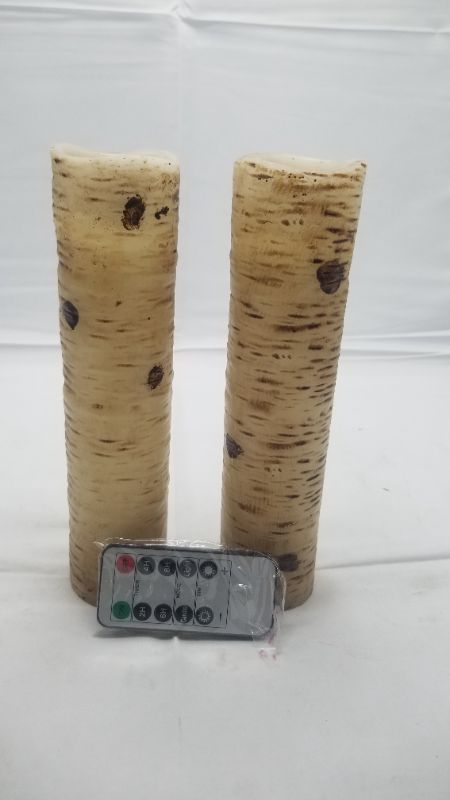 Photo 4 of Flameless Candles LED Candles Birch Bark Effect Set of 2  Ivory Real Wax Pillar Battery Operated Candles with Dancing LED Flame Key Remote Control and Cycling 24 Hours Timer New
