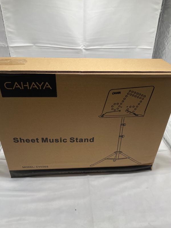 Photo 2 of CAHAYA 2 in 1 Dual Use Sheet Music Stand & Desktop Books Stand Unique Musical Note Patent Design with Carrying Bag Foldable Tripod Portable Sturdy for Laptop Projector Books Stand CY0203