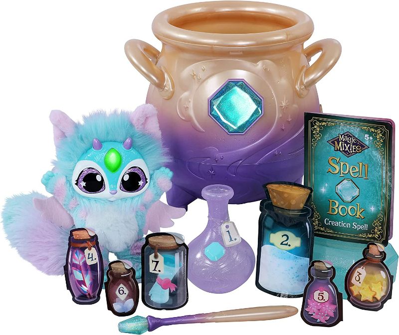 Photo 2 of Magic Mixies Magical Misting Cauldron with Interactive 8 inch Blue Plush Toy and 50+ Sounds and Reactions, Multicolor