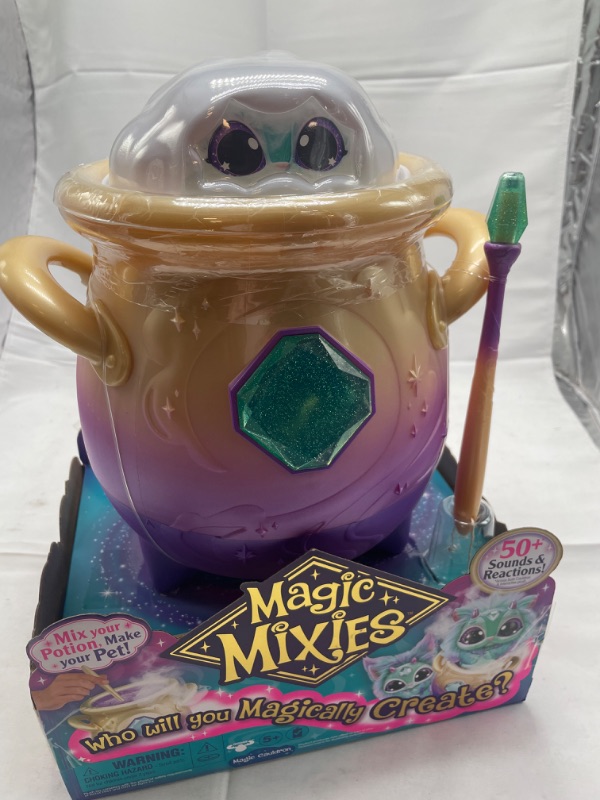 Photo 4 of Magic Mixies Magical Misting Cauldron with Interactive 8 inch Blue Plush Toy and 50+ Sounds and Reactions, Multicolor