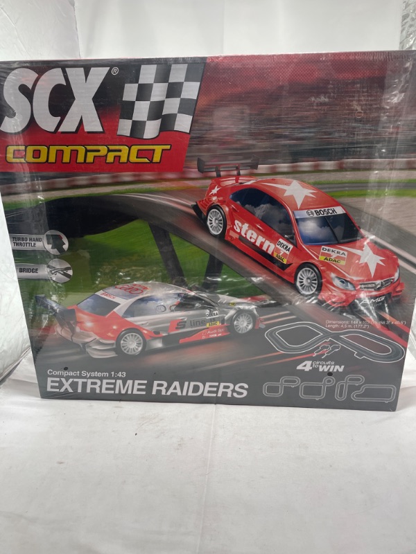 Photo 4 of SCX Extreme Raiders 1:43 Scale Slot Car Set With AC Adaptor and 2 Cars