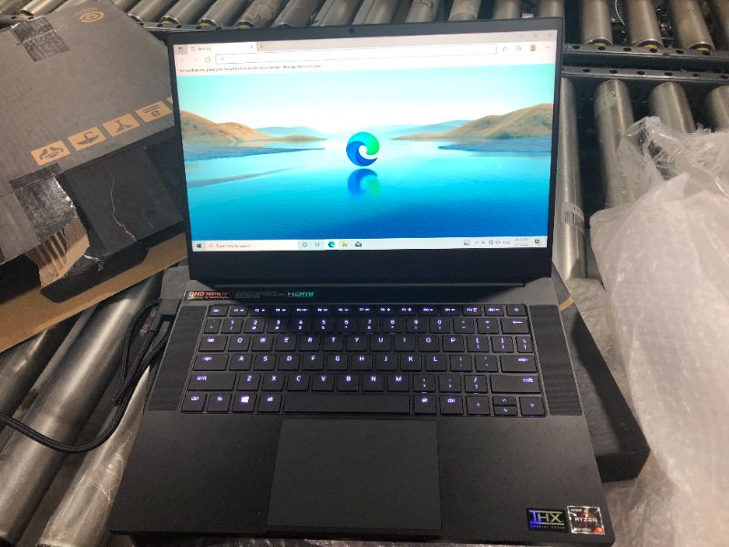 Photo 3 of Razer Blade 14 Gaming Laptop: AMD Ryzen 9 5900HX 8 Core, NVIDIA GeForce RTX 3070, 14" QHD 165Hz, 16GB RAM, 1TB SSD - CNC Aluminum - Chroma RGB - THX Spatial Audio - Vapor Chamber Cooling
