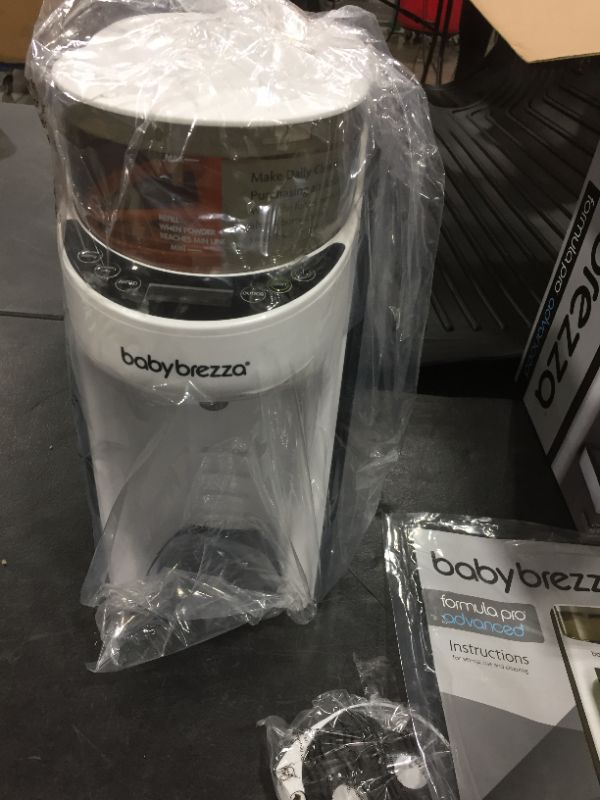 Photo 2 of New and Improved Baby Brezza Formula Pro Advanced Formula Dispenser Machine - Automatically Mix a Warm Formula Bottle Instantly - Easily Make Bottle with Automatic Powder Blending
