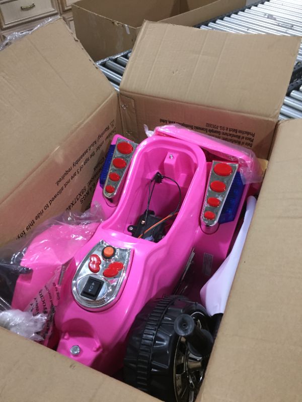 Photo 1 of Electric Motorcycle for Kids – 3-Wheel Battery Powered Motorbike for Kids Ages 3 -6 – Fun Decals, Reverse, and Headlights by Lil’ Rider (Pink)
