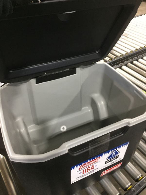 Photo 3 of Coleman Rolling Cooler | 50 Quart Xtreme 5 Day Cooler with Wheels | Wheeled Hard Cooler Keeps Ice Up to 5 Days, Black
