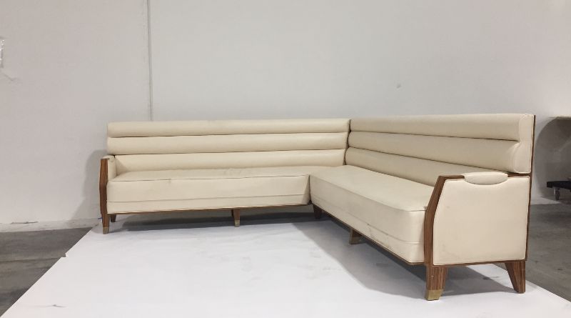 Photo 1 of CREME COLORED FAUX LEATHER L SHAPE SECTIONAL COUCH 100L X 26W X 38H INCHES (2 PIECES)