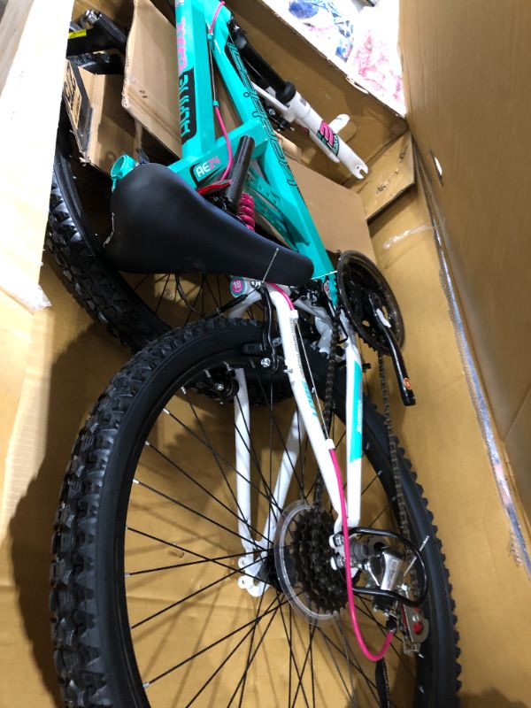 Photo 2 of Dynacraft Vertical Dual Suspension Mountain Bike Girls 24 Inch Wheels with 18 Speed Grip Shiter and Dual Hand Brakes in Teal and Pink
