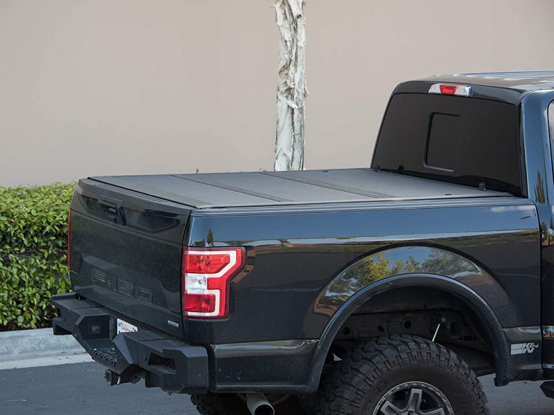 Photo 1 of Armordillo USA 7162372 CoveRex TFX Series Low Profile Hard Tri-Fold Truck Bed Tonneau Cover Fits 2009-2018 Dodge Ram 1500 / 2019-2022 Classic / 2010-2019 2500 3500 6.4 Ft ( 76.8" ) Bed
