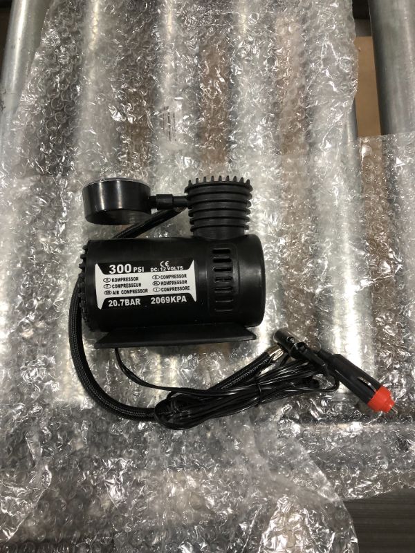 Photo 2 of Black DC 12V 300PSI Tyre Tire Electric Inflator Pump Air Compressor for Car Auto
