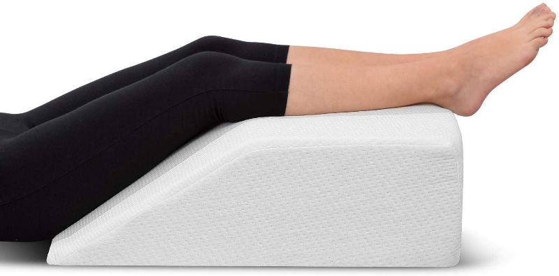 Photo 1 of abcosport Leg Elevation Memory Foam Pillow with Removeable, Washable Cover - Elevated Pillows for Sleeping, Blood Circulation, Leg Swelling Relief and Sciatica Pain Relief - Pillow for Back Pain and Pregnancy

