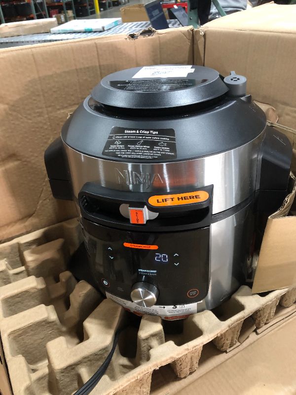 Photo 1 of Ninja OL701 Foodi SMART XL 8 Qt. Pressure Cooker Steam Fryer with SmartLid & Thermometer + Auto-Steam Release, 14-in-1 that Air Fries, Bakes & More, 3-Layer Capacity, 5 Qt. Crisp Basket, Silver/Black
