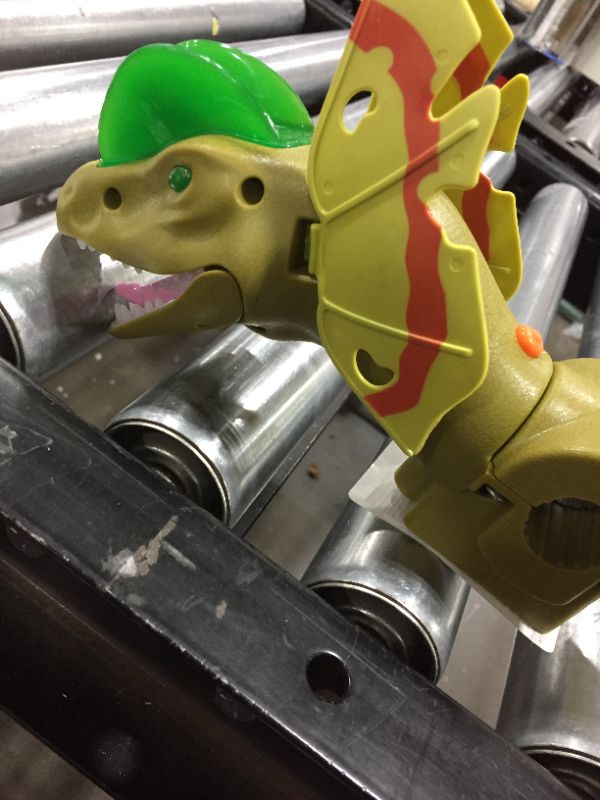 Photo 1 of DINO HEAD TOY 