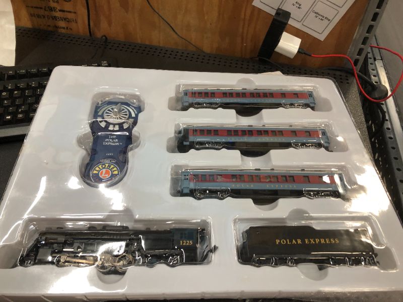 Photo 4 of Lionel The Polar Express Electric HO Gauge, Model Train Set with Remote and Bluetooth + 4-Piece Straight Track Expansion
