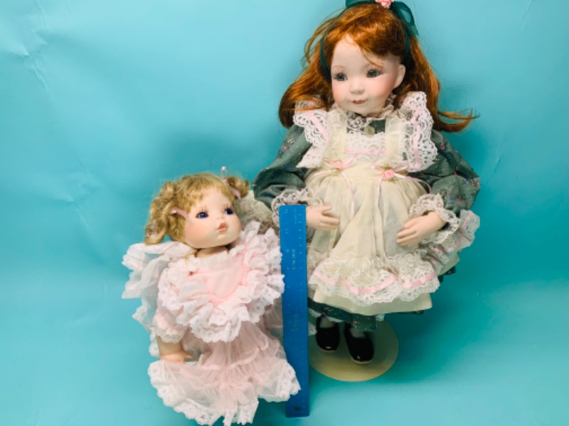 Photo 1 of 802516…2 vintage porcelain dolls on stands