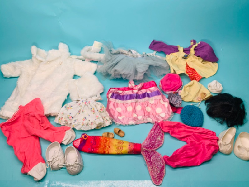 Photo 1 of 802521…vintage baby doll clothing- some need cleaning 