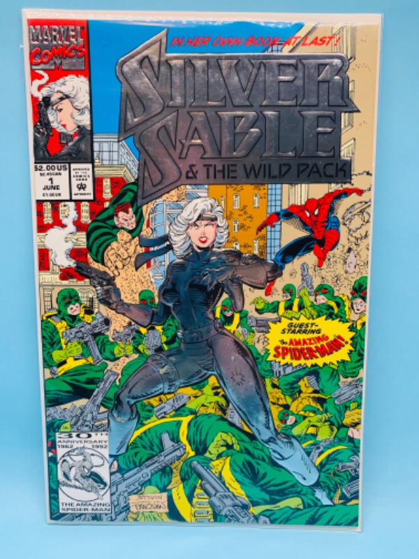 Photo 1 of 802554…silver sable comic 1 embossed cover Guest starring Spider-Man in plastic sleeve
