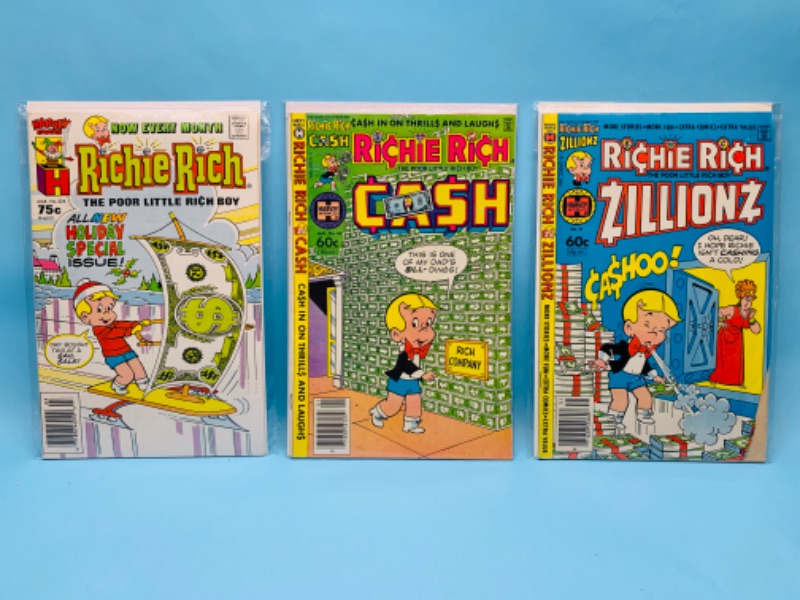 Photo 1 of 802566… 3  vintage Richie Rich comics in plastic sleeves