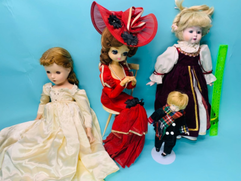 Photo 1 of 802599…4 vintage porcelain dolls. One needs to be put back together 
