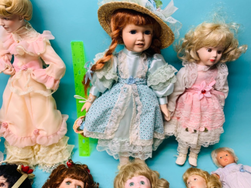 Photo 2 of 802606…12 vintage dolls- most porcelain - one is wind up