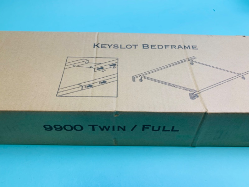 Photo 3 of 802608…twin/ full metal bed frame with four legs and casters in box 