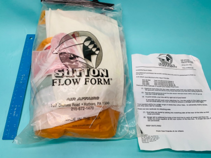 Photo 1 of 802641…large Sutton flow form kite in package 