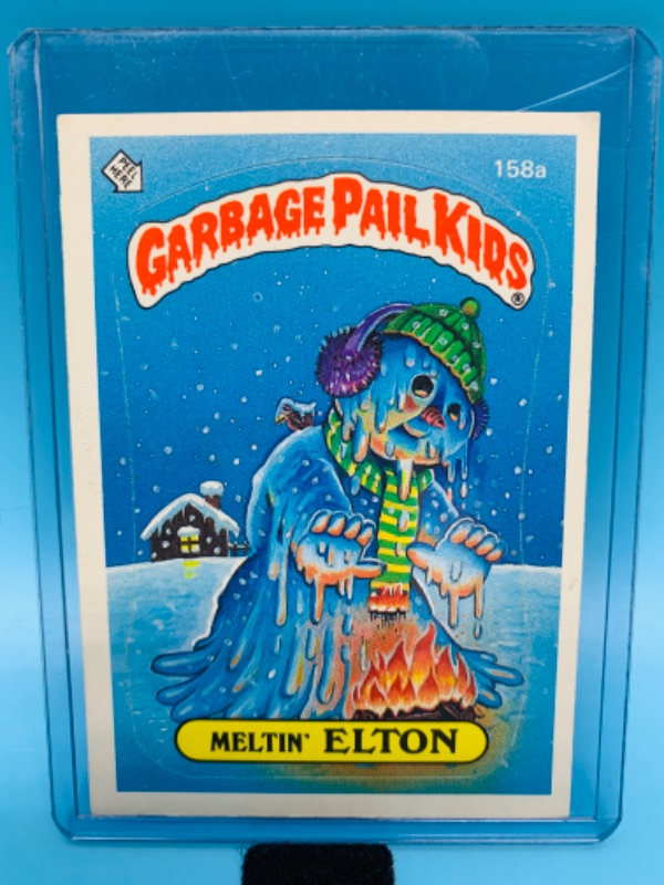 Photo 1 of 802678…vintage garbage pail kids sticker card meltin Elton in hard plastic sleeve 