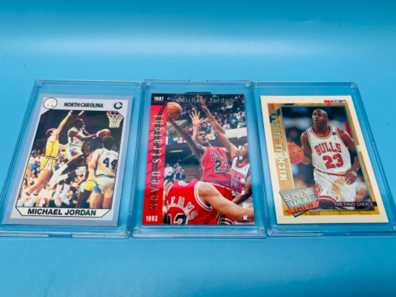 Photo 1 of 802685…3 Michael Jordan trading cards in hard plastic cases 