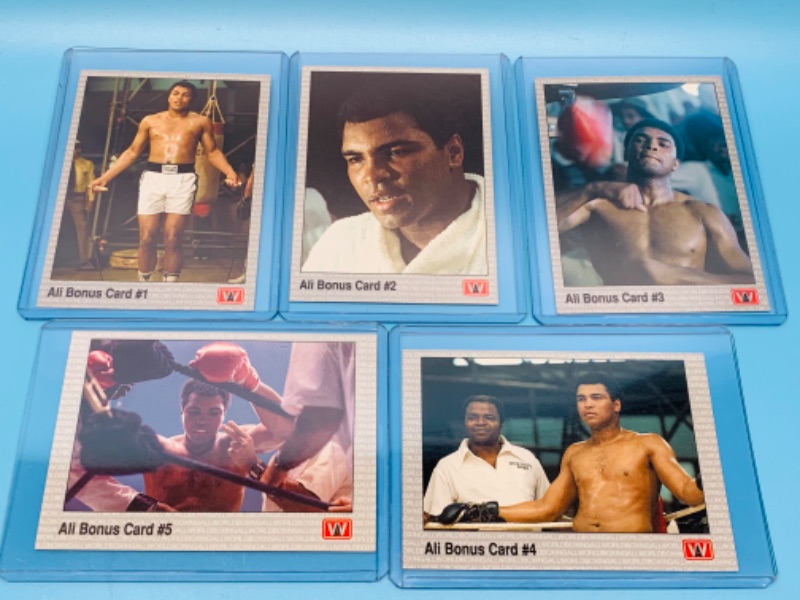 Photo 1 of 802687…5 Muhammad Ali trading cards in hard plastic sleeves 