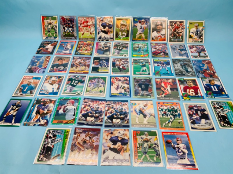 Photo 1 of 802708…50 football quarterbacks cards in plastic sleeves 