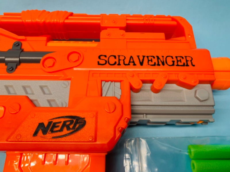 Photo 2 of 802709…like new nerf scravenger toy gun