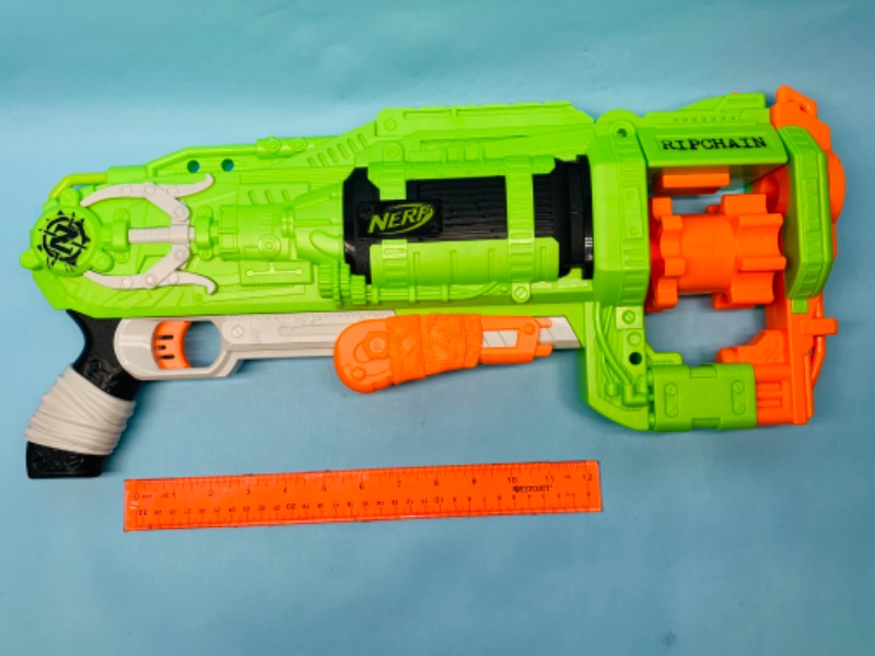 Photo 1 of 802717…like new nerf ripchain toy gun- does not include ammo chain - will have to purchase separately 