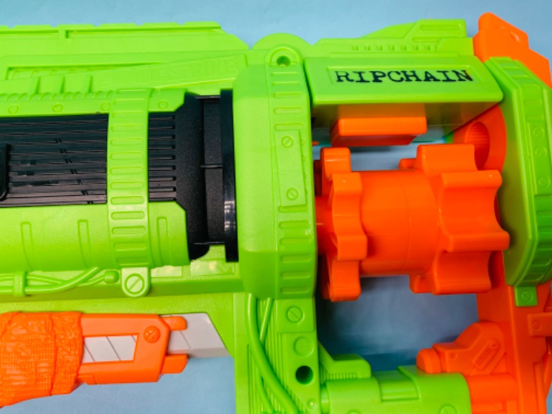 Photo 2 of 802717…like new nerf ripchain toy gun- does not include ammo chain - will have to purchase separately 