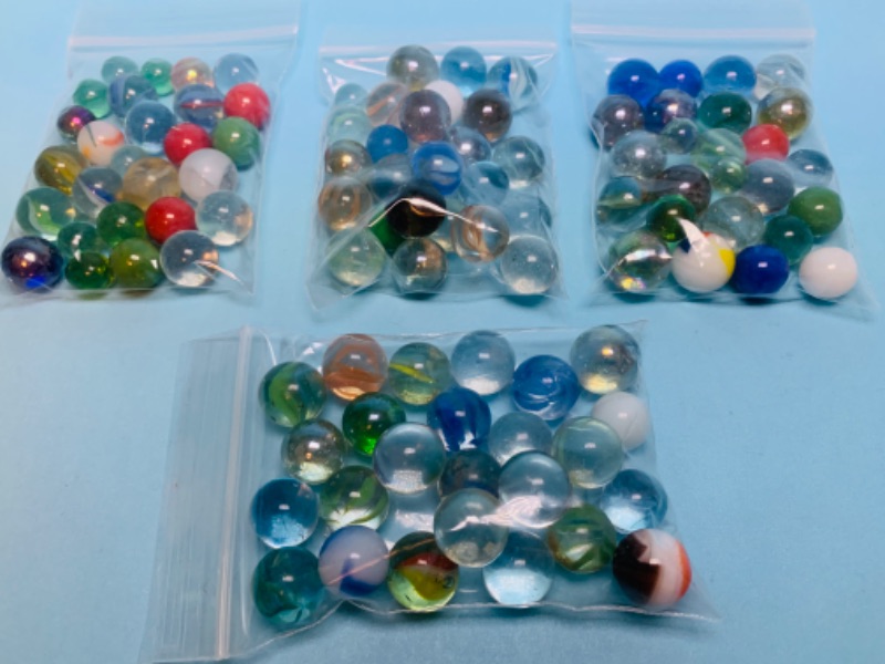 Photo 1 of 802729…100 glass marbles 