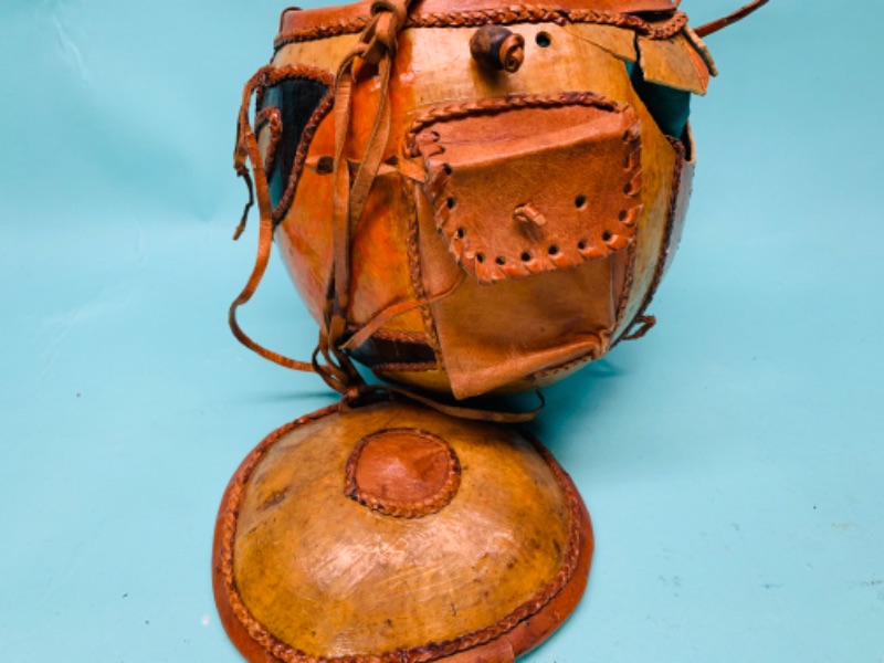 Photo 4 of 802764…antique tribal gourd with leather decorative stitching, top, pouch, liner. Has broken part but great display piece  see photos 