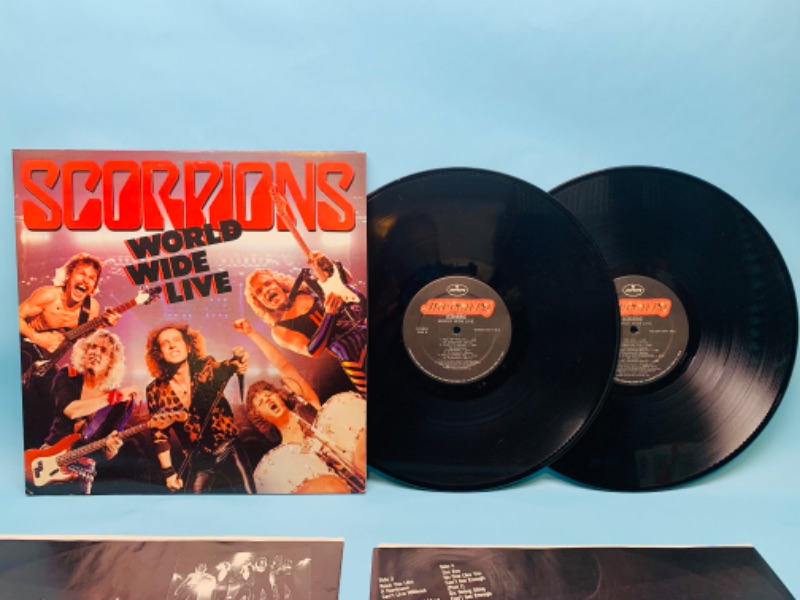 Photo 2 of 802807…great condition scorpions world wide live vinyl 2 record set in plastic sleeves covers and records in great condition for age 