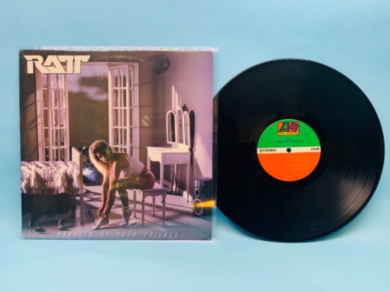 Photo 1 of 802808…great condition Ratt vinyl record in plastic sleeve cover and record in great condition for age 