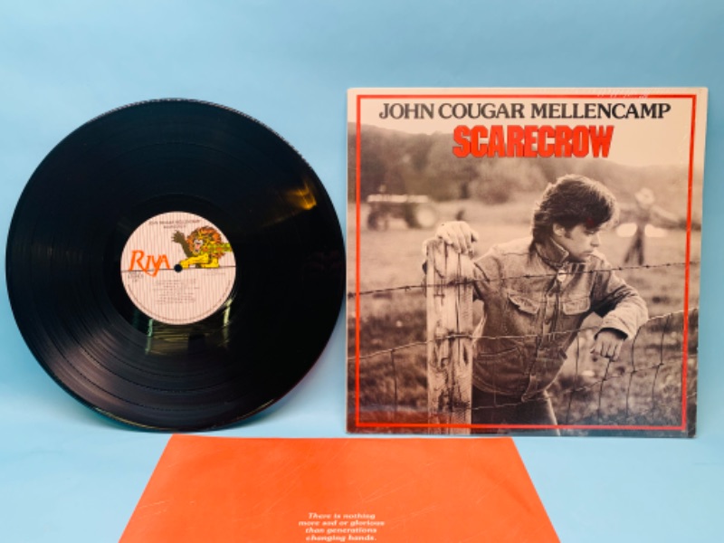 Photo 1 of 802815…great condition John cougar Mellencamp vinyl record in plastic  cover and record in great condition for age 