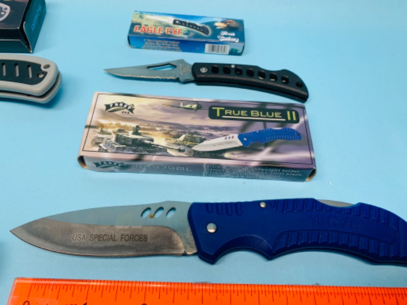 Photo 1 of 802829…4 folding knives in boxes- 3 frost cutlery 
