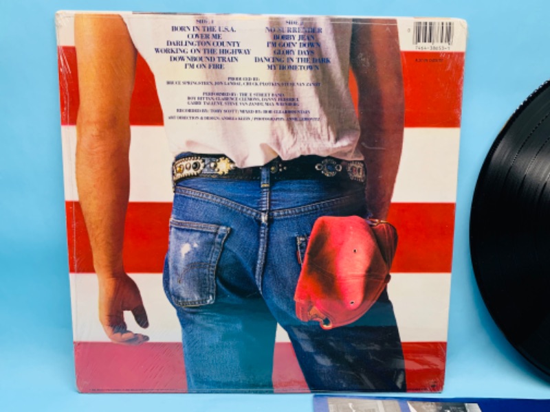 Photo 2 of 802920…great condition vinyl Bruce Springsteen record in plastic cover and record in great condition for age 