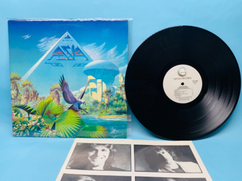 Photo 1 of 802921…great condition vinyl Asia record in plastic sleeve cover and record in great condition for age 