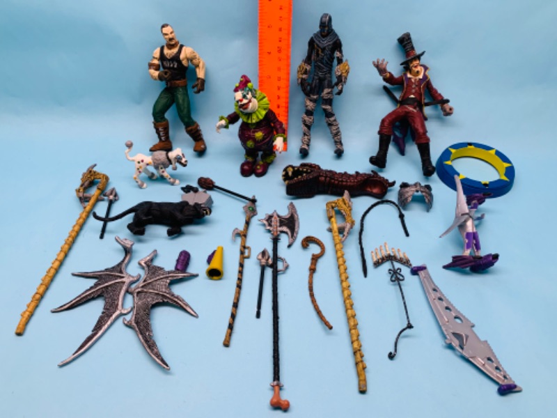 Photo 1 of 802999…misc action figures and weapons 