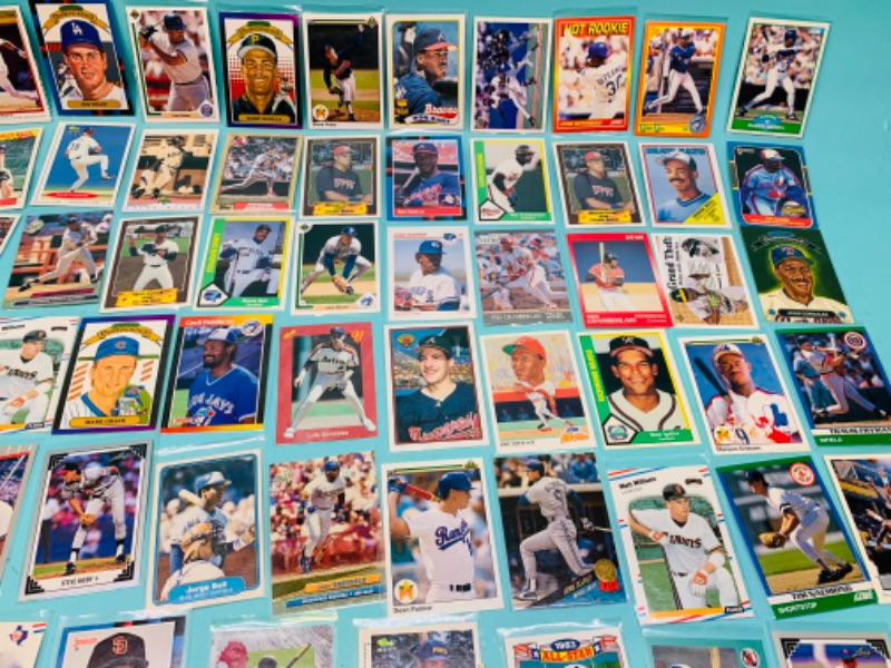 Photo 1 of 803051… 70 misc baseball cards in plastic sleeves 