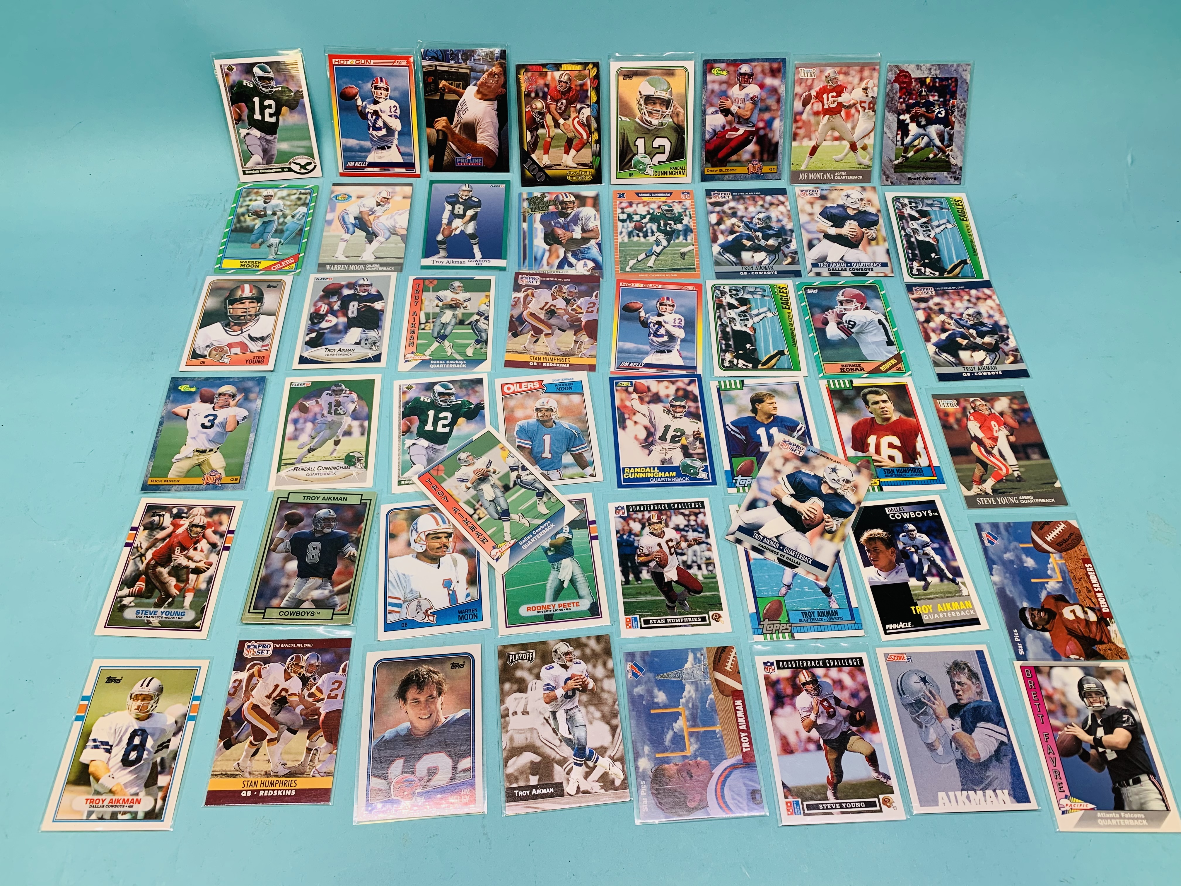 Photo 3 of 803052…50 nfl quarterback trading cards in plastic sleeves 