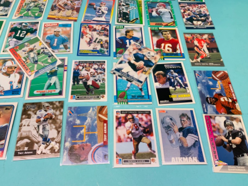 Photo 2 of 803052…50 nfl quarterback trading cards in plastic sleeves 