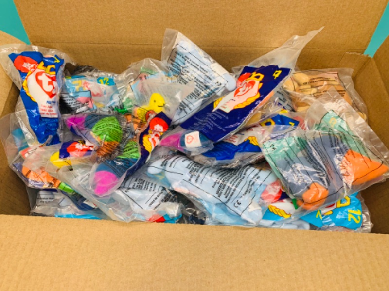 Photo 1 of 803099… box of 75 sealed McDonald’s ty beanie babies in packages- many duplicates 