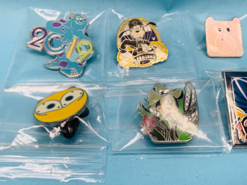 Photo 1 of 803222…15 Disney pins in plastic bags 