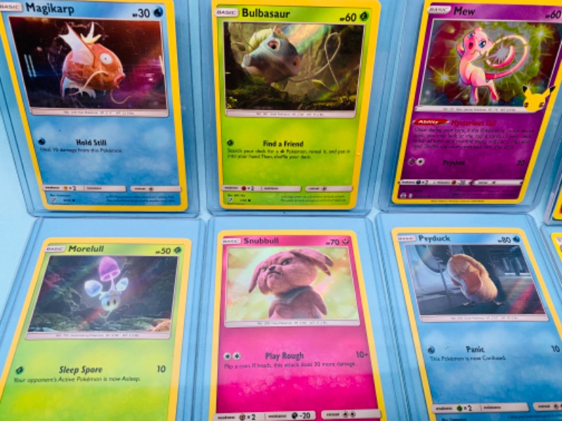 Photo 3 of 803252…12 Pokémon trading cards some holo in hard plastic sleeves 